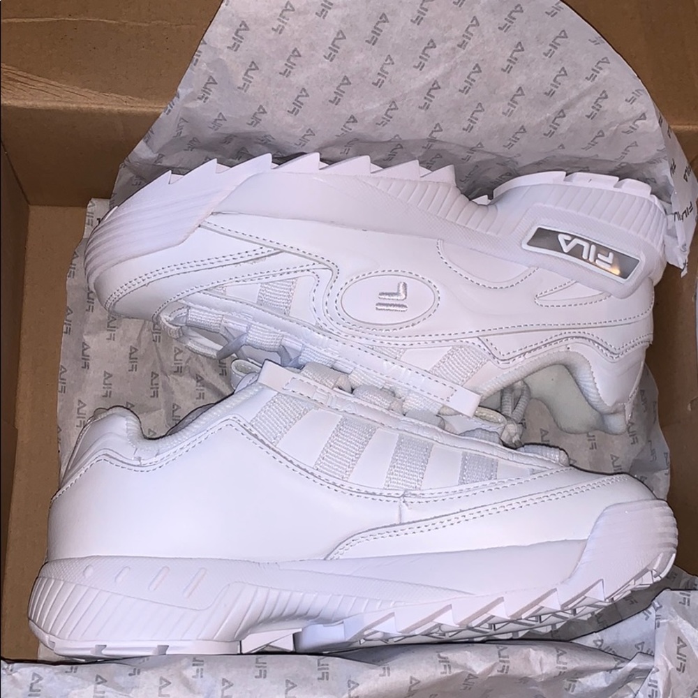 All white Fila shoes